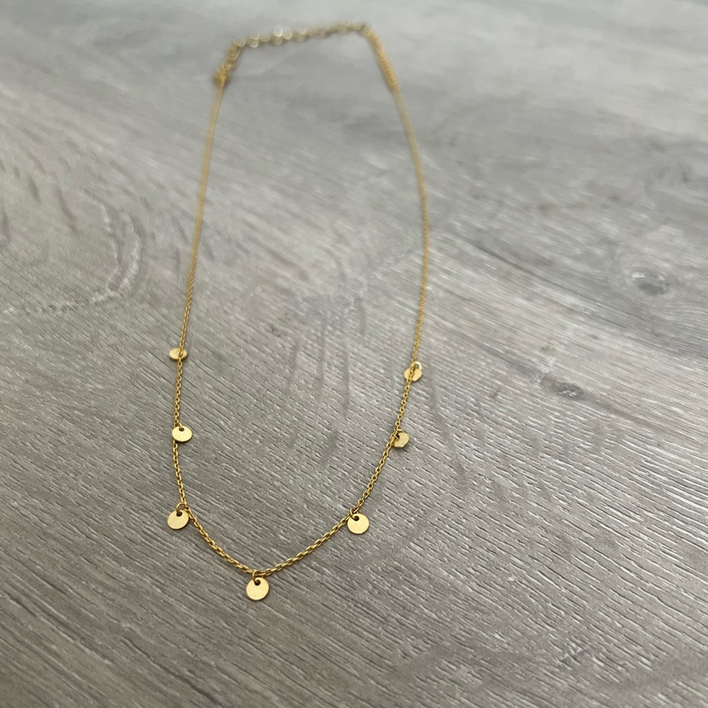 Gold coin choker style necklace